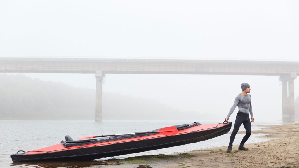 Man pulling a paddle board