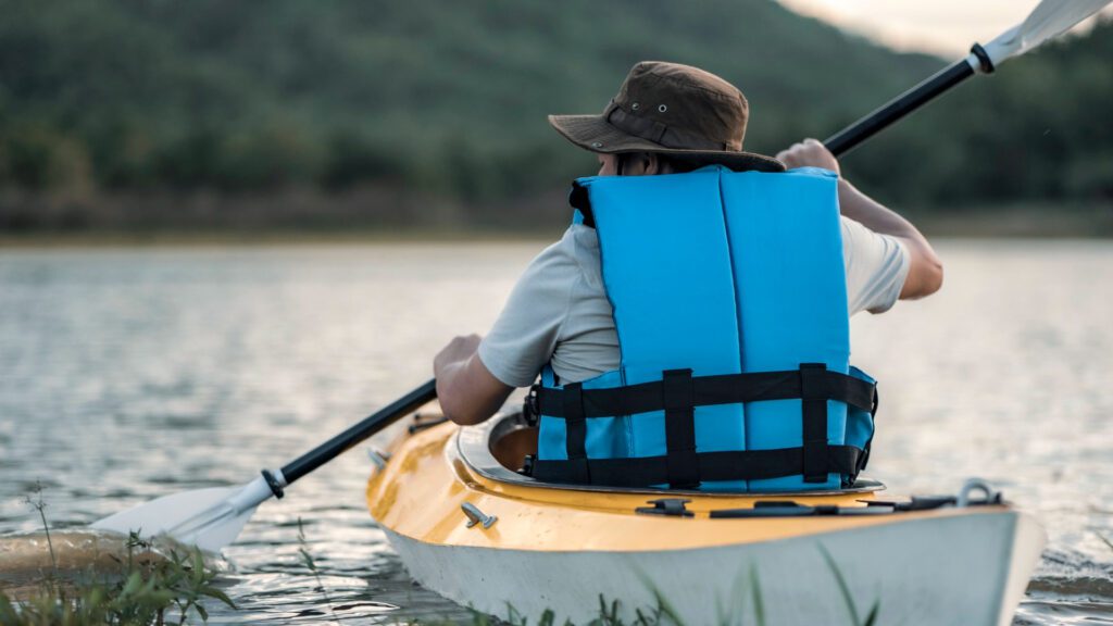 Man kayak in lake in Illinois